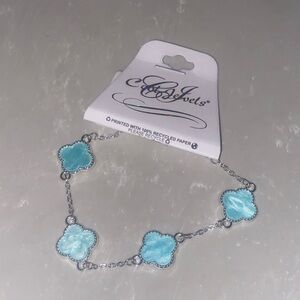 Adjustable Silvertone and turquoise Blue colored Bracelet NWT